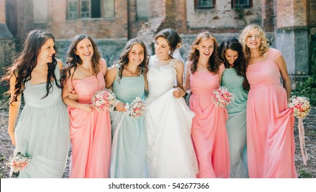 Beautiful bride with her pretty bridesmaids 