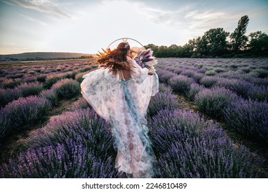 Beautiful bride in a lavender field at sunset. 