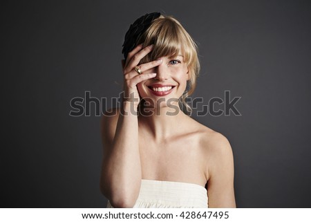 Similar – Happy blonde woman posing near a huge flower