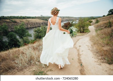 Beautiful Bride Walk Down The Aisle With Bouquet.