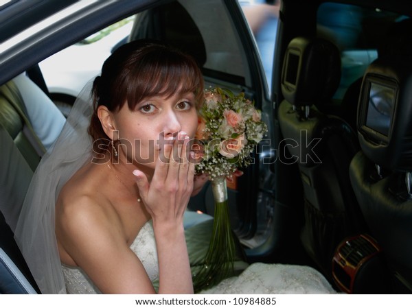 Beautiful bride in wedding car, before wedding\
ceremonial, summer,\
Siberia