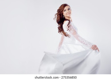 Beautiful Bride In Wedding Dress, White Background