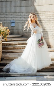 Beautiful Bride In A Wedding Dress.girl In A White Puffy Dress