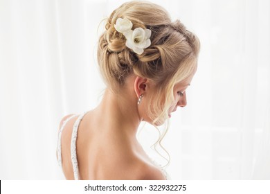 A beautiful brides hairstyle for wedding  - Powered by Shutterstock