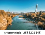 beautiful bridge at sunset, standing as a key tourist attraction in Podgorica, Montenegro connecting the urban center with the serene riverside landscape.