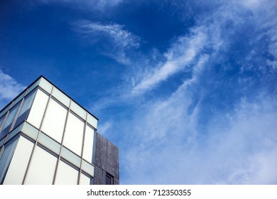 beautiful brilliant and dynamic cloudscape over modern building