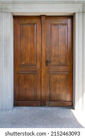 Beautiful Brown Hardwood Doors. Church Entrance Door, Straight View, No People.