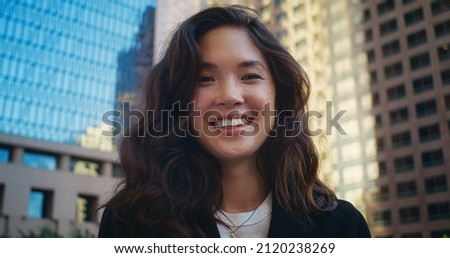 Similar – young asian woman looking up