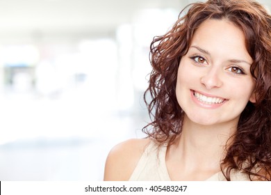 Beautiful Brunette Girl Smile Portrait In A Interior Background