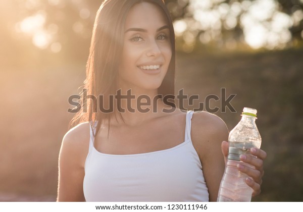 brunette and her bottle