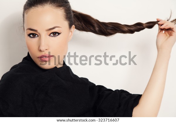 Beautiful Brunette Holds Her Long Ponytail Stock Photo Shutterstock