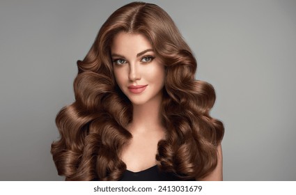 Beautiful  brunette model  girl  with long curly  hair . Smiling  woman hairstyle wavy curls .     Fashion , beauty and makeup portrait. Treatment, care and spa procedures. - Powered by Shutterstock