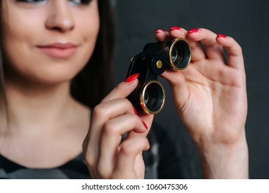 Beautiful Brunette Sexy Spy Agent (killer Or Police) Woman With A Binocular In Her Hand Stalking Someone