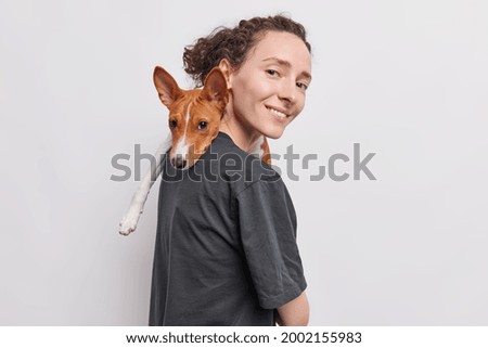 Similar – Foto Bild Hübscher schwarzer Hund mit brauner Zeichnung schaut zur Seite