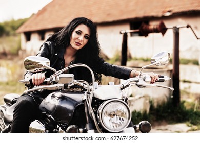 Beautiful  Brunette Woman With A Classic Motorcycle (cinema Bleach Bypass Effect)