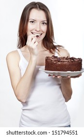 Beautiful Brunette Woman Eating Chocolate Cake