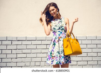 yellow purses and handbags