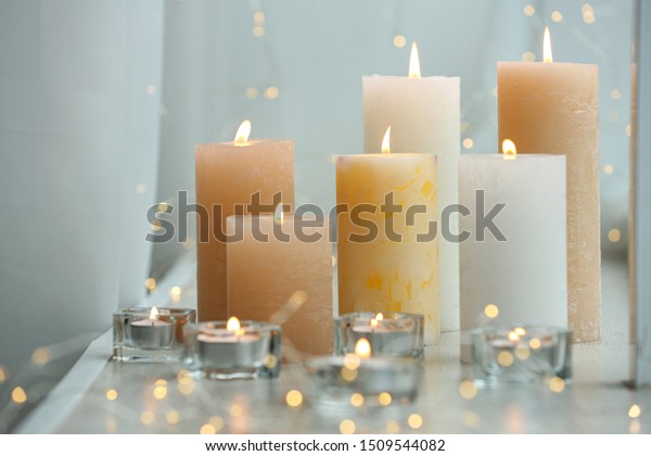 Beautiful Burning Candles Fairy Lights On Stock Photo Edit Now