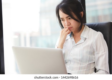 Beautiful business asian woman using a laptop computer.  - Shutterstock ID 1442698616
