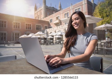 Beautiful Business Grad School Student Typing On Laptop Computer At University School Campus 