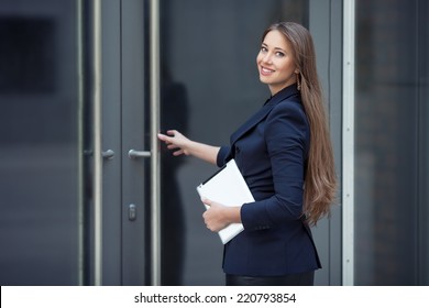 A Beautiful Business Woman Entering The Office