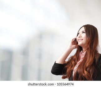 Beautiful Business Woman Happy Speak Mobile Phone And Loo To Copy Space At Office, Model Is A Asian Beauty