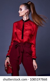 Beautiful Business Woman Lady Style Perfect Body Shape Brunette Jewelry Earrings Wear Fashion Clothes Red Silk Blouse Pants Portrait Cosmetic Makeup Accessory Bag Glamour Model Pose Party Office.