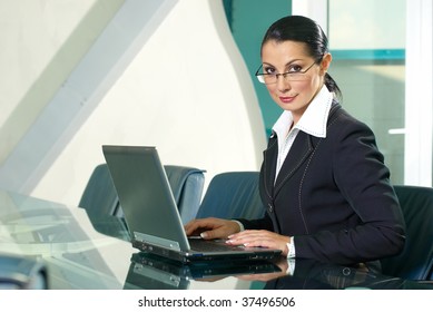 Beautiful business woman in points at office - Shutterstock ID 37496506