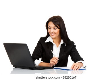 Beautiful Business Woman Smile Sitting At The Desk Working Using Laptop Looking At Screen, Hand Writing, Isolated Over White Background