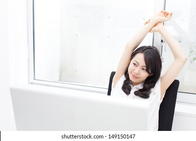 Beautiful Business Woman Taking A Break At Office 