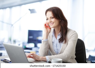 Beautiful Business Woman Talking On Mobile Phone