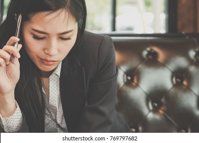 Beautiful Business Woman Thinking.