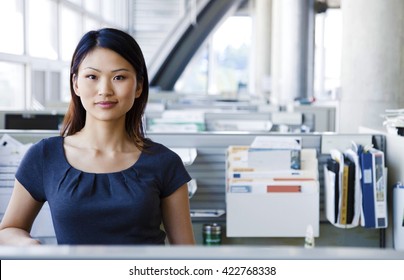 Beautiful business woman with a very relaxed, friendly smile.