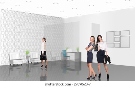 Beautiful businesswoman consultants standing at the office
