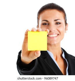 Beautiful businesswoman showing a blank post-it. You can add your own text