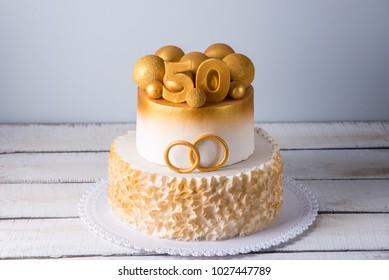 https://image.shutterstock.com/image-photo/beautiful-cake-50th-anniversary-wedding-260nw-1027447789.jpg