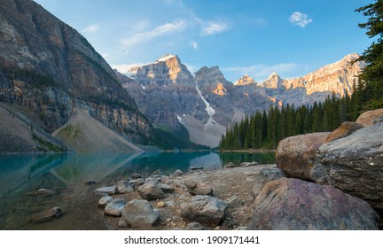 A Beautiful Calm Summer Morning At The Glacial Blue Waters Of Moraine Lake In Banff National Park, Alberta, Canada. 