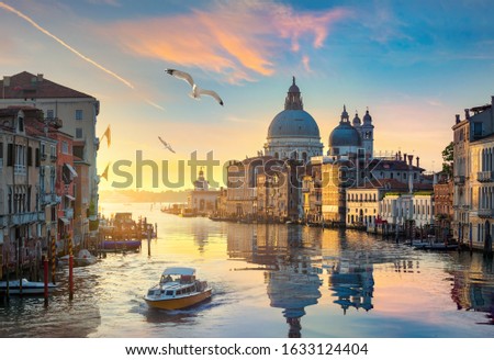 Beautiful calm sunset over Grand Canal in Venice, Italy