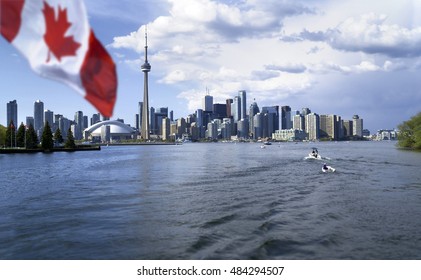 Beautiful Canada Flag Is Waving Front Of Famous Toronto City View