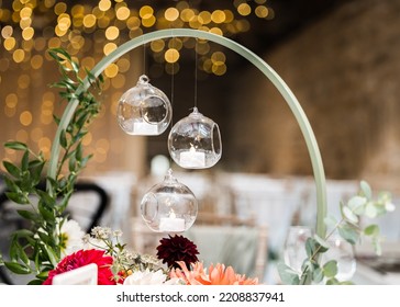 Beautiful Candle Light Wedding Table Decor With Flowers And Out Of Focus Twinkle Lights. Wedding Breakfast Party.