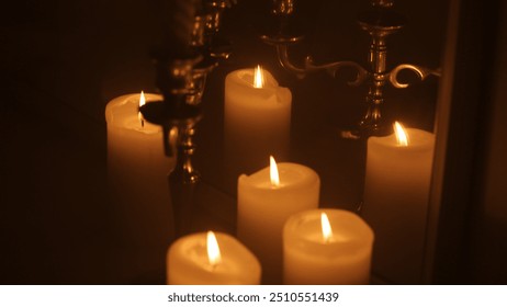 beautiful candles burning reflection in the mirror - Powered by Shutterstock