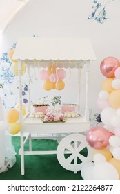 Beautiful Candy Bar Decor With Homemade Craft Marshmallows And Cupcakes In A Wooden White Cart