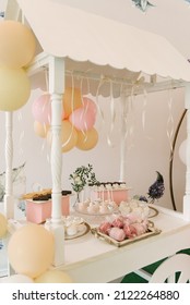 Beautiful Candy Bar Decor With Homemade Craft Marshmallows And Cupcakes In A Wooden White Cart