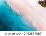 Beautiful caribbean beach in Dominican Republic. Aerial abstract view of tropical idyllic summer landscape with small figures of people, sea coast and white sand