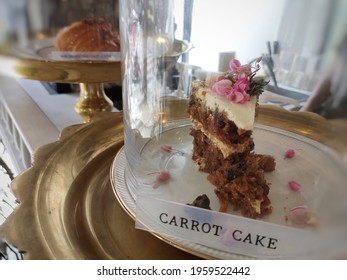 Beautiful Carrot Cake Decorated With Coral Vine Flowers With The Words 