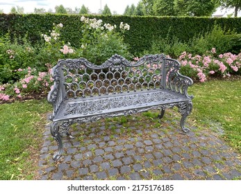 Beautiful Cast Iron Bench In An English Garden