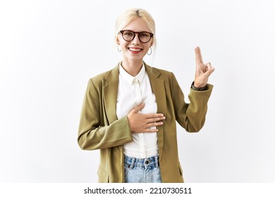 Beautiful Caucasian Business Woman Standing Over Isolated Background Smiling Swearing With Hand On Chest And Fingers Up, Making A Loyalty Promise Oath 