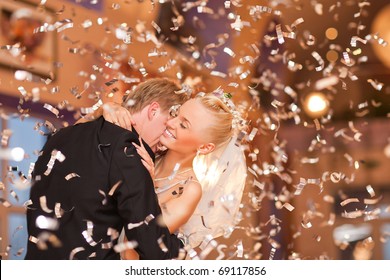 beautiful caucasian couple just married and dancing their first dance - Powered by Shutterstock