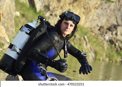 beautiful caucasian diver woman in the water - Powered by Shutterstock