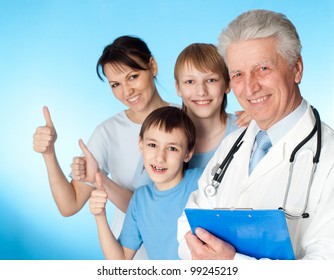 Beautiful Caucasian elderly doctor with a patient on a blue background